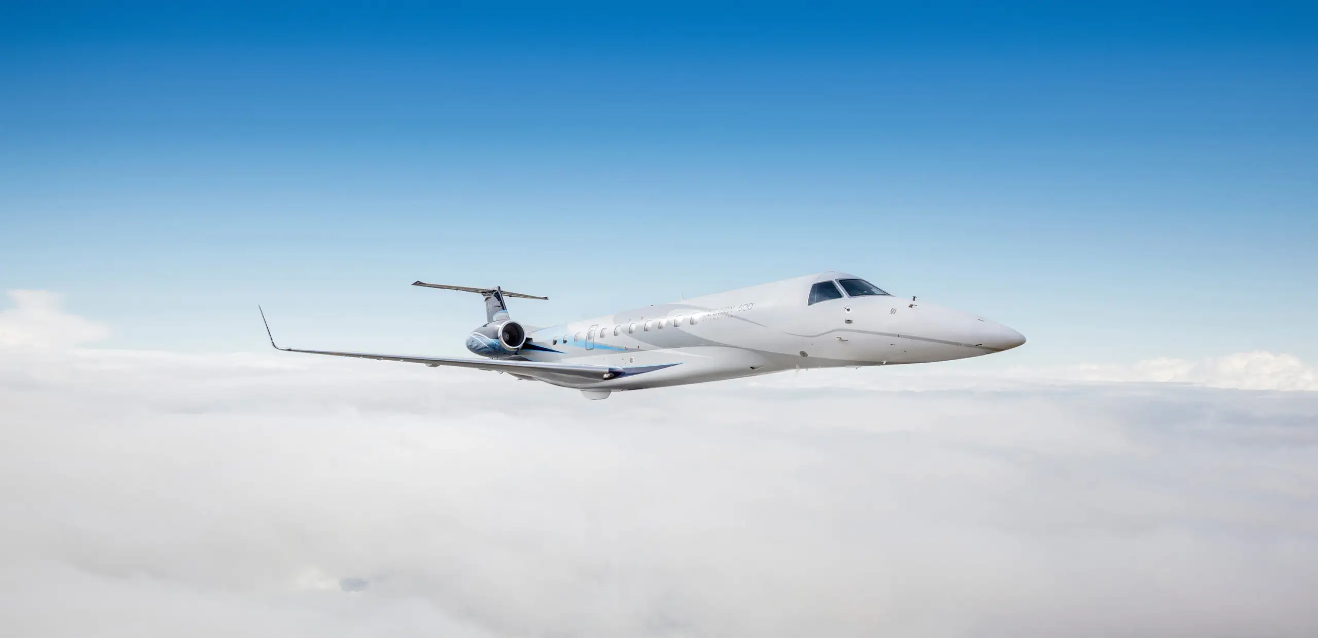 An Embraer Legacy 600 above the clouds in one of our empty legs flights.